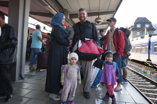 Family at train station