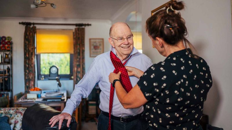 tie dressing father daughter, CREDIT Peter Kindersley (Centre for Ageing Better library)
