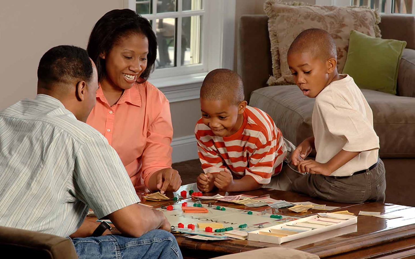 Family playing board game
